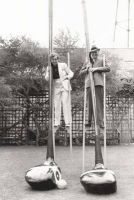 Man & Woman on Stilts with Giant Golf Clubs Journal - 150 Page Lined Notebook/Diary (Paperback) - Cool Image Photo