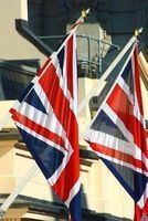 A Pair of British Union Jack Flags Hanging in London, England - Blank 150 Page Lined Journal for Your Thoughts, Ideas, and Inspiration (Paperback) - Unique Journal Photo