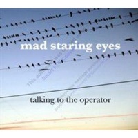 Mad Staring Eyes Talking to the Operator Photo