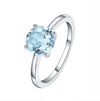 Classic 4 Claw Blue Topaz Solitaire Ring Photo