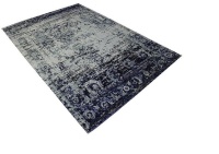 Modern rug in blue and black Photo
