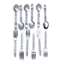 Black and white beaded spoon and cake fork set Photo