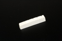 Allparts Acoustic Guitar Resonant Plastic Slotted Nut - White Photo