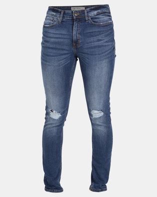 Photo of New Look Bert Busted Knee Skinny Jeans Mid Blue