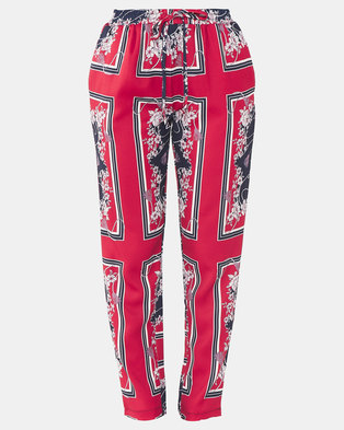 Photo of cath.nic By Queensparkk Chain Print Woven Trousers Red