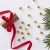 Ginger Ray Red and Gold Christmas Gold Bells Confetti Photo