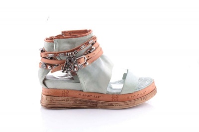 Photo of Women's green leather wedge with ankle jewellery