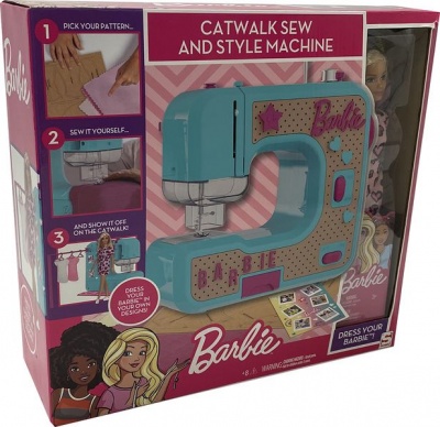 Photo of Barbie Sewing Machine With Doll