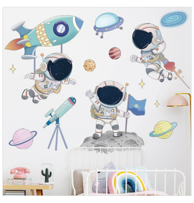 Photo of AOOYOU Planet and Spaceman Cartoon Vinyl Art Sticker for Wall Decoration