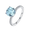 Exquisite Blue Topaz Ring - Round Brilliant Cut Photo